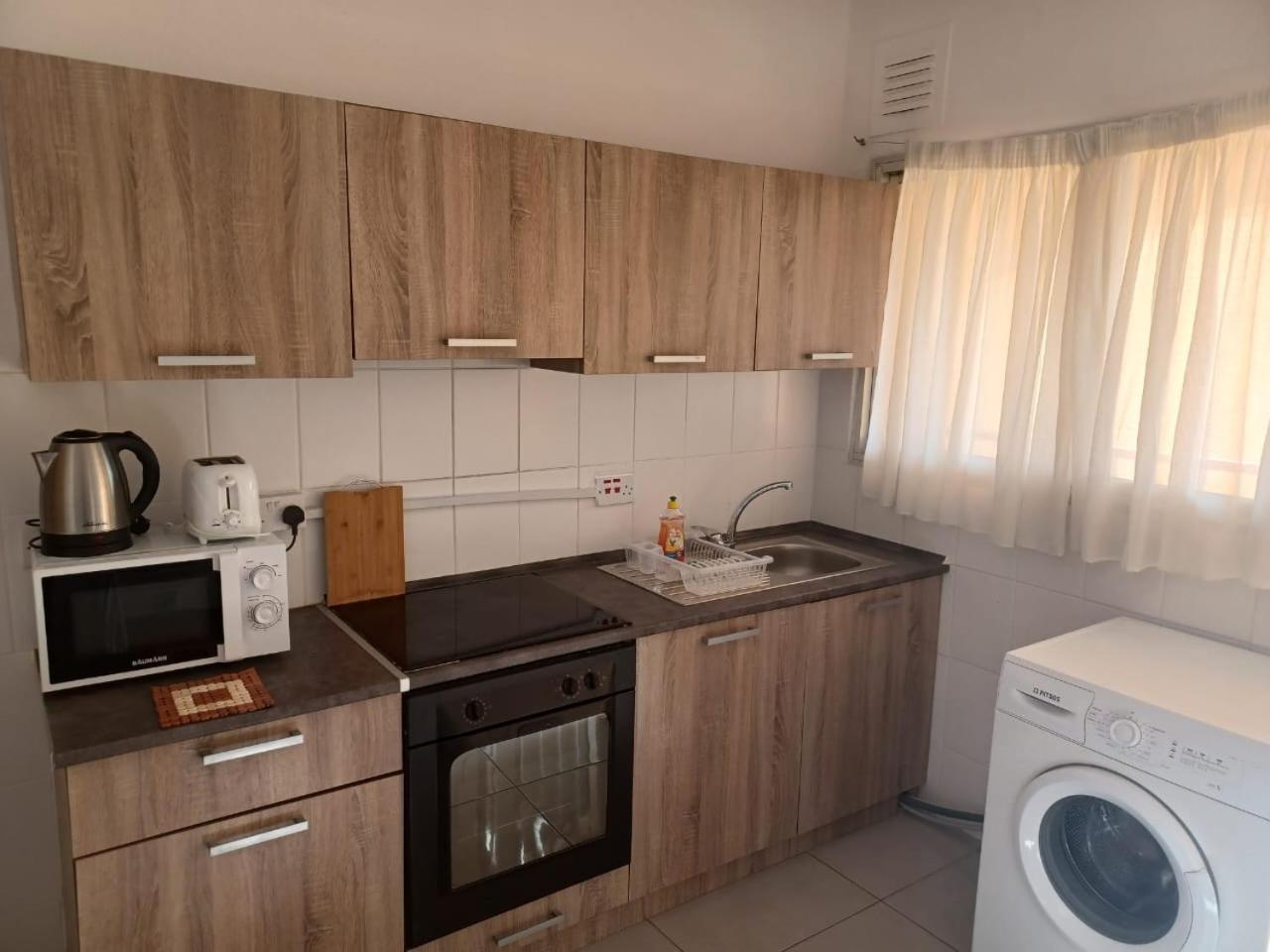 Terpsichore Holiday Apts ลิมาซอล ภายนอก รูปภาพ